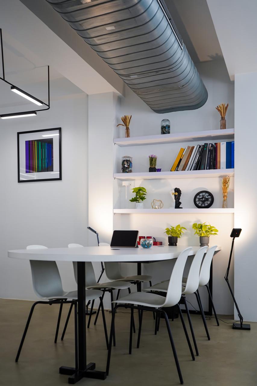 Vertical view of collaboration area and decorative shelving